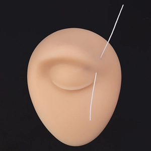 Macro detail of silicone tattoo practice skin for eyebrow and eyeliner training exercises