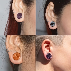 Premium natural stone ear gauges collection featuring amethyst and obsidian ear plugs set