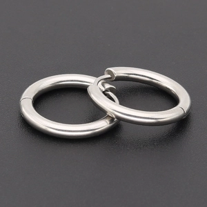 Set of 9 pairs silver stainless steel hoop earrings with 4-prong zircon stud combinations