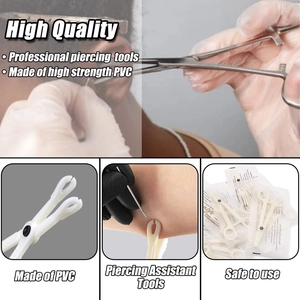 Sterile disposable piercing kit including white PVC forceps and needles in macro detail