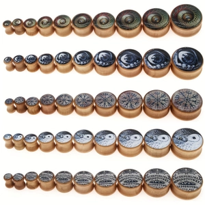 Wooden ear plugs with owl eye, compass and yin yang designs in assorted sizes