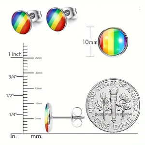 Size chart for 10mm rainbow stud earrings with ruler and dime for scale reference