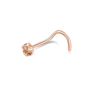 Detailed view of champagne zircon nose stud with rose gold claw setting piercing