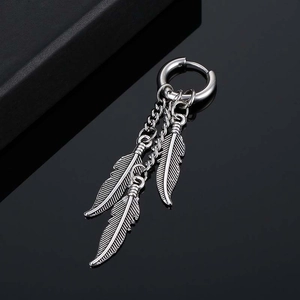Minimalist stainless steel hoop earrings with double hanging feather pendants in silver finish