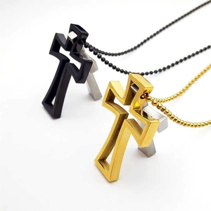 Three-color layered hollow cross pendants in black, gold, and silver on ball chains