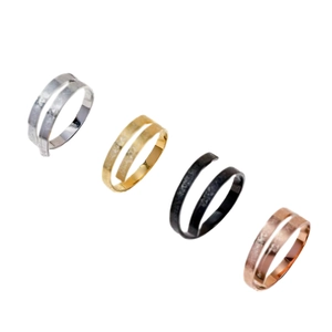 Set of four stainless steel Islamic cuff rings in gold, silver, black, and rose gold colors