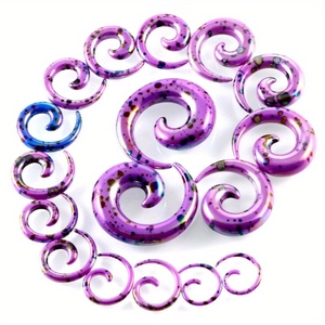 Detailed set of purple spiral acrylic ear tapers with colorful paint splatter finish