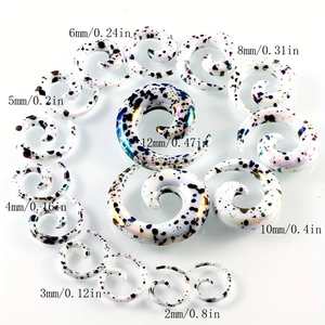 Acrylic snail spiral ear gauges with black and blue spots in sizes 2mm to 12mm