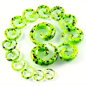 Set of neon green acrylic spiral ear tapers with black splatter detail for stretching