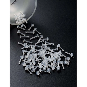 Λήψη macro από διαφανή ακρυλικά στηρίγματα piercing με ράβδο Τ για τη μύτη και τα χείλη