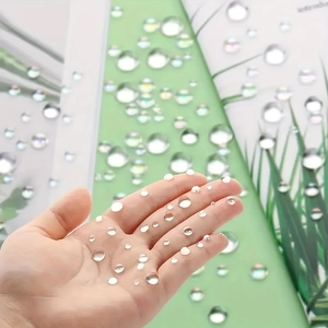 Macro detail of transparent dome rhinestones in varied sizes for DIY craft and nail art