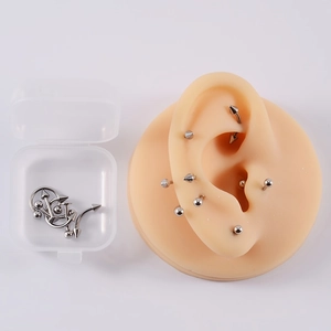Set di 12 piercing in acciaio inossidabile con sfere e punte e scatola trasparente