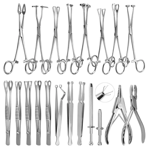 Complete professional stainless steel body piercing tool kit set with various surgical clamps
