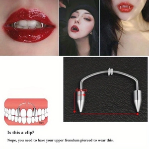 Dettaglio di piercing fangs vampiro con punte in acciaio inossidabile da 4mm e barra curva