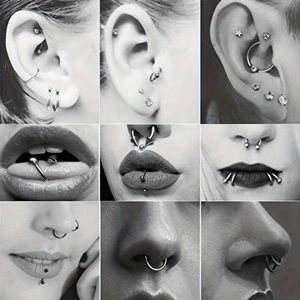 Griglia dettagliata di aghi per piercing in acciaio e vari stili di gioielli