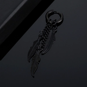 Macro shot of black stainless steel earring with triple feather charms on chains