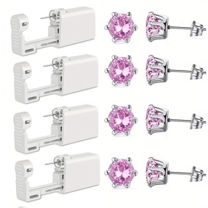 Detail van vier wegwerp oorpiercing eenheden met roze zirkonia oorbellen met zes klauwen