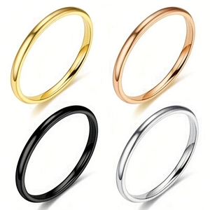 Polished 2mm stainless steel rings in gold, rose gold, black, and silver finishes