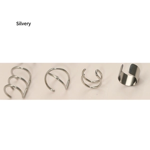 Detail of four silvery stainless steel ear cuffs in multiple minimalist open hoop styles