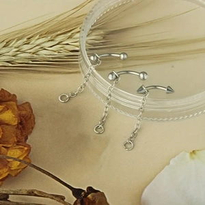 Elegant stainless steel lip and eyebrow piercing set with punk chains and silver studs