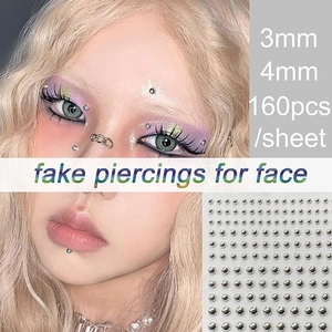 Self-adhesive silver face gems set with 3mm and 4mm studs for faux piercing makeup look