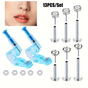 13-piece body piercing kit including two disposable ear piercers and crystal studs