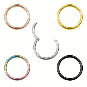 Detail of 316L stainless steel clicker segment rings with hinged opening in 5 colors