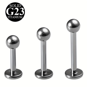 Three solid G23 titanium flat back studs with ball tops in various lengths for body piercing