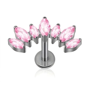 Detalle macro de un labret de titanio G23 con circonitas rosas en forma de abanico