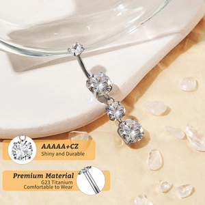Detailed macro view of 14G G23 titanium belly ring with AAAAA grade cubic zirconia stones