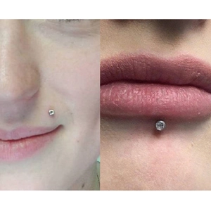 Detailansicht der Edelstahl-Lippenstecker mit Zirkon an Ober- und Unterlippe