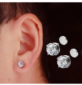 Macro detail of magnetic zircon stud earrings with silver metal base for non-pierced ears