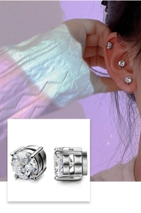 Macro shot of silver magnetic stud earrings with round cubic zirconia and non-pierced fit