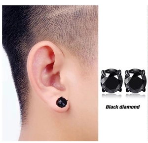 Detail showing black zircon magnetic stud earrings in four-prong stainless steel setting
