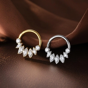 G23 titanium 16G septum rings with 5A zircon in gold and silver finish on silk