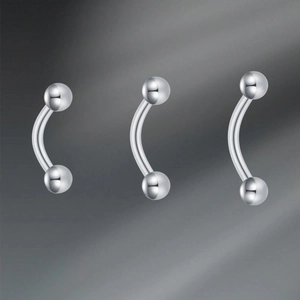 Three-piece stainless steel curved barbell eyebrow rings with polished silver finish