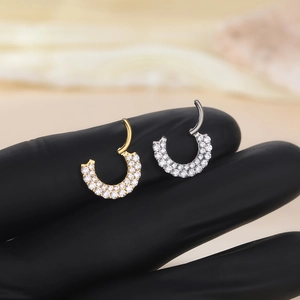 Double-layered 16G septum clicker with sparkling zircons in gold and silver finish