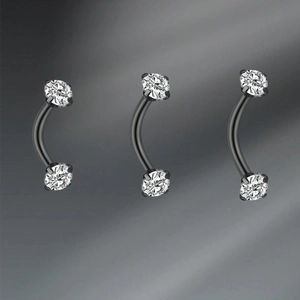 Three pieces of black stainless steel curved barbells with clear zircon stones for piercings