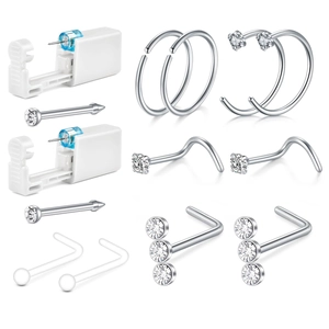 Macro-opname van 18G/20G piercingset met wegwerpgereedschap en stalen neusringen