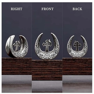 Detailed views of stainless steel crescent ear gauges with gothic cross and bird design