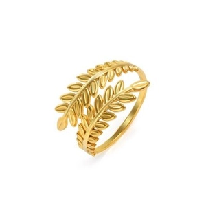 Detailed view of the gold irregular bamboo texture and olive leaf layered open ring