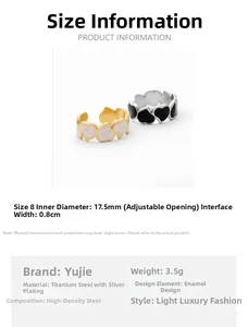 Detail view of heart pattern rings with titanium steel texture and 17.5mm adjustable size