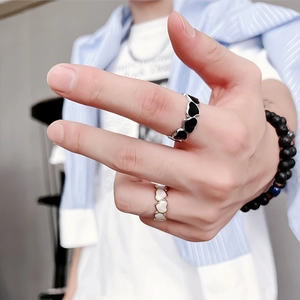 Minimalist black and white heart-shaped rings in silver and gold finish for women