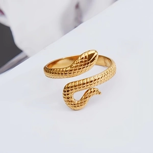 Adjustable golden snake ring in stainless steel with textured scales and wrap-around design