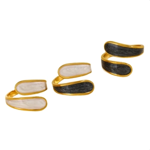 Three minimalist gold adjustable rings with enamel inlay in black and white tones