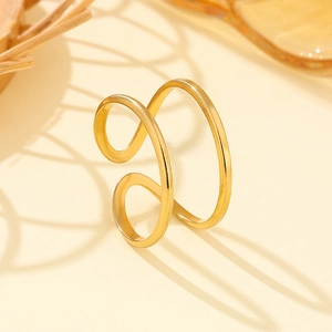 Minimalist double-layer gold stainless steel open ring on a warm beige background