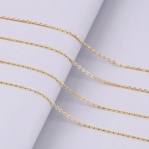 Polished 18k gold plated stainless steel O-chain necklace on a minimalist stand