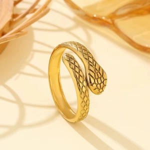 Minimalist gold snake ring in stainless steel with adjustable open band and scale texture