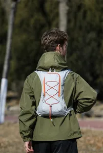 Rear view of lightweight cycling backpack with breathable mesh straps and orange accents
