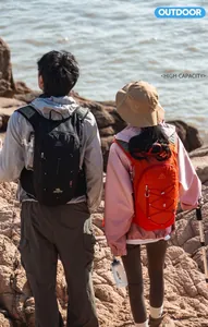 Detail view of 18L lightweight outdoor hiking backpacks in black and orange waterproof nylon